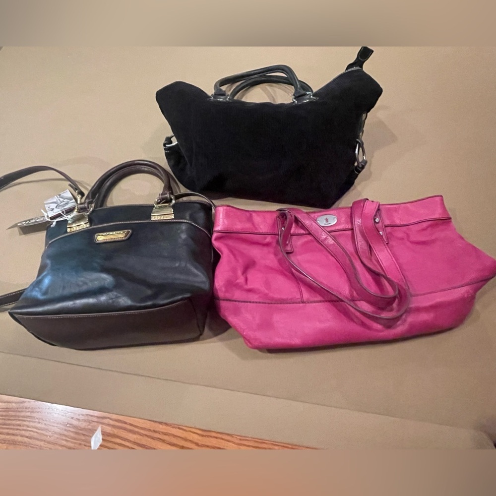 Multiple handbags.  Tommy Hilfiger and fossil